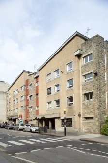 View of front elevation of Spence, Glover & Ferguson Canongate Housing, 97-103 Canongate, Edinburgh, from SE.