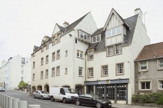 General view of front elevation of 1-12 White Horse Close, 29 Canongate, Edinburgh, from SE.