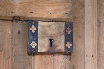 Barn, 1st floor, granary, detail of wooden door lock