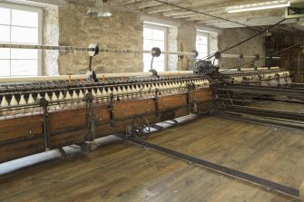 Interior. Main mill building, view of spinning mules (Platt Brothers, Oldham, c.1870)