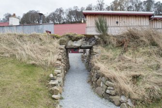 Mill lade going over path, view from north. Known as the Creepie, this allowed access under the lade pipe between the dwellings, blanket drying store and main mill building