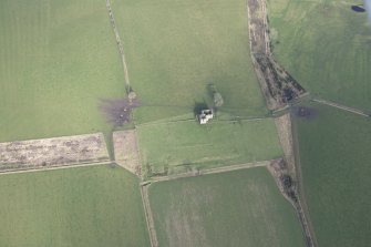 Oblique aerial view of Pittarthie Castle, looking N.