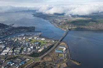 General oblique aerial view of the Kessock Bridge,  Longman Industrial Estate and Beauly Firth, looking WNW.