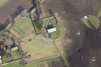 Oblique aerial view of Birnie Parish Church and cemetery, looking NNE.