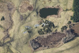 Oblique aerial view of the Carn Glas cairns, looking W.