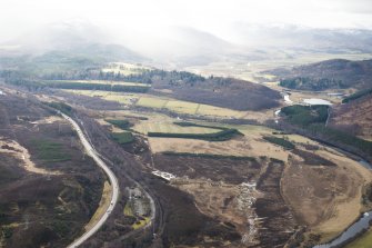 General oblique aerial view of the Invernahavon battlesite at the confluence of the Spey and Truim, looking SW.