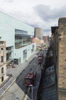 View looking east along Renfrew Street, showing the fire engines outside the fire damaged Mackintosh building.
