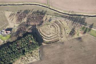 Oblique aerial view of the earthwork, looking N.