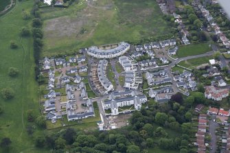 Oblique aerial view of Dunfermline College of Physical Education, looking SE.