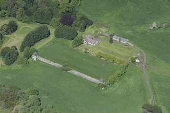 Oblique aerial view of the site of Hatton House, looking NW.