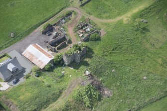 Oblique aerial view of Kipps Farmhouse and Kipps Tower, looking SW.
