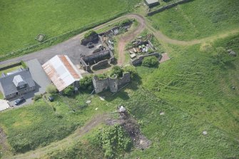 Oblique aerial view of Kipps Farmhouse and Kipps Tower, looking SSW.