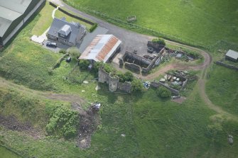 Oblique aerial view of Kipps Farmhouse and Kipps Tower, looking SSE.