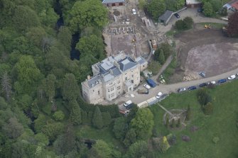 Oblique aerial view of Crossbasket Country House, looking NE.