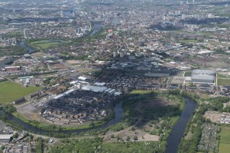 Oblique aerial view of the Commonwealth Games Village and Emirates Arena, looking WNW.