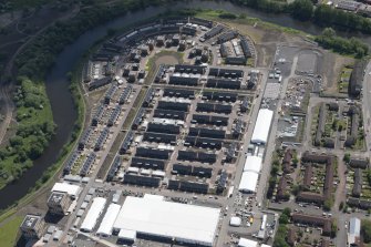 Oblique aerial view of the Commonwealth Games Village, Celtic Park and Emirates Arena, looking SE.