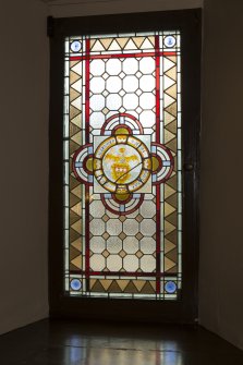 Grand staircase. Detail of stained glass window.