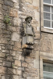 Detail of carved figure between first and second floors of Morocco Land, 265-267 Canongate, Edinburgh.