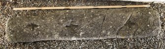 Recumbent slab with 3 incised crosses (including scale)