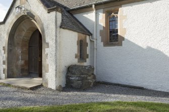 View showing location of slab alongside font at entrance to church