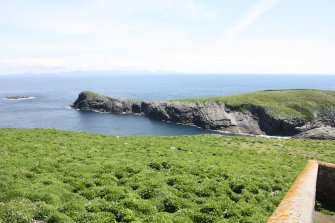 View over lighthouse enclosure to Eilean Tighe.