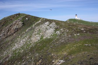 General view of Meall Meadhonach and the lighthouse, Flannan, looking E.