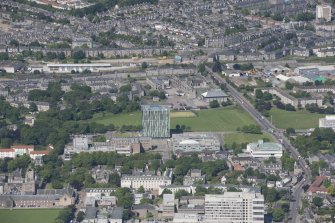 General oblique aerial view centred on the Sir Duncan Rice library, looking W.