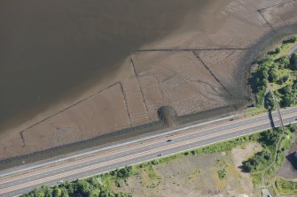 Oblique aerial view of the timber ponds and the traps for Peeler crabs at Kelburn Park, looking NE.