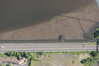 Oblique aerial view of the timber ponds and the traps for Peeler crabs at Kelburn Park, looking NNE.