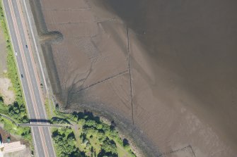 Oblique aerial view of the timber ponds and the traps for Peeler crabs at Kelburn Park, looking NW.