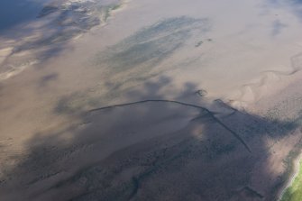 Oblique aerial view of the fish traps at Ardoch, looking SW.