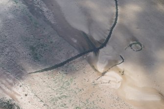 Oblique aerial view of the fish traps at Ardoch, looking SSE.