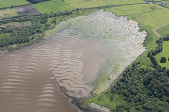 Oblique aerial view of the fish trap, looking E.