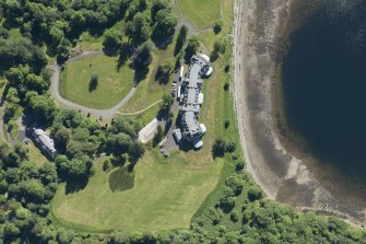 Oblique aerial view of Ardgartan House, looking E.