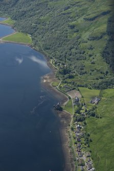 Oblique aerial view of Carrick Castle and village of Carrick, looking SSE.