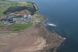 Oblique aerial view of Hunterston Nuclear Power Station, looking S.