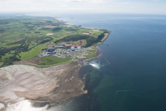 General oblique aerial view of Hunterston Nuclear Power Station, looking S.