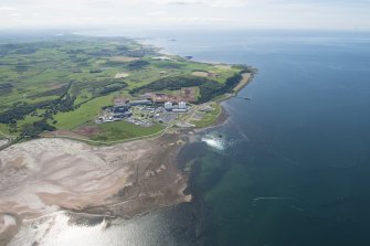 General oblique aerial view of Hunterston Nuclear Power Station, looking S.