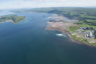 General oblique aerial view of Hunterston Nuclear Power Station and Ore Terminal, looking NNE.