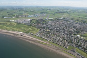 General oblique aerial view of Prestwick and Prestwick Airport, looking ENE.