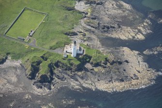 Oblique aerial view of Turnberry Castle and Turnberry Lighthouse, looking S.