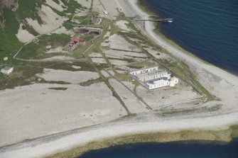 Oblique aerial view of Foreland Point Lighthouse, keeper's cottages and gasworks, looking NNW.