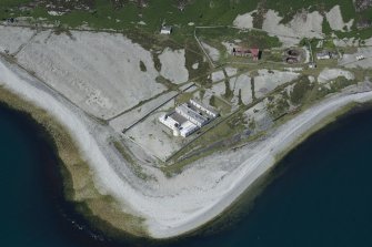 Oblique aerial view of Foreland Point Lighthouse and gasworks, looking WSW.