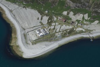 Oblique aerial view of Foreland Point Lighthouse, keeper's cottages and gasworks, looking WSW.