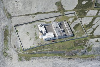 Oblique aerial view of Foreland Point Lighthouse, looking SW.