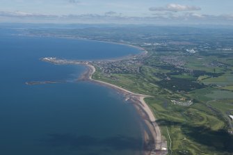 General oblique aerial view of the Ayrshire coast, with Troon, Royal Troon Portland and Lochgreen Golf Courses and Pretwick Golf Course, looking NNW.