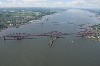 General oblique aerial view of the Upper Firth of Forth with The Queensferry Crossing construction, The Forth Road bridge and Forth bridge, looking W.