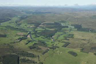 General oblique aerial view of the River Findhorn at Tomatin with the Allt Bruachaig in the foreground, looking WSW.