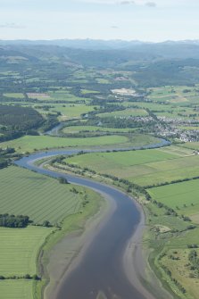 General oblique aerial view of the River Beauly with Beauly in the middle distance, looking SW.
