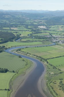 General oblique aerial view of the River Beauly with Beauly in the middle distance, looking SW.